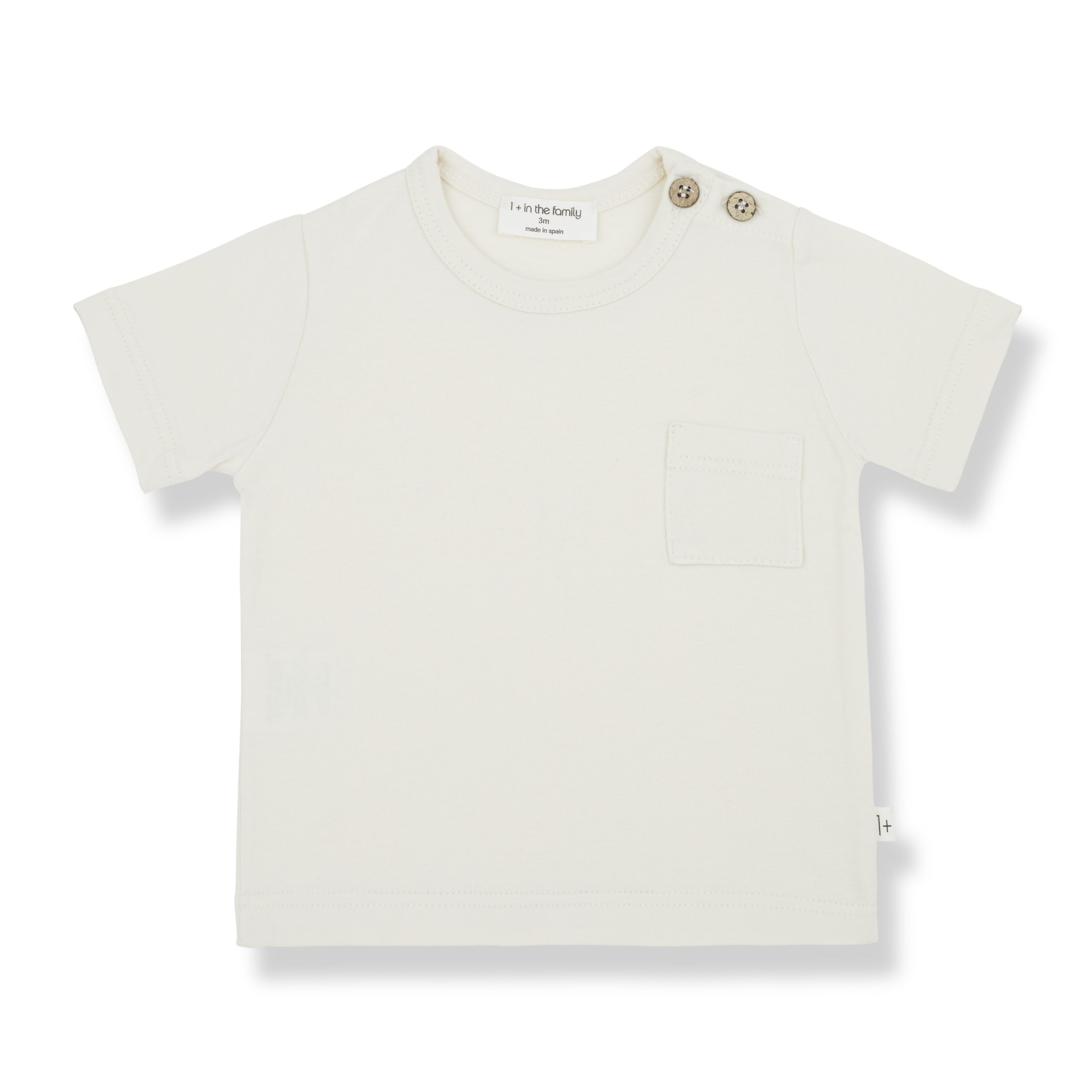 T-shirt bébé coton ivoire manches courtes avec poche et boutons sur l’épaule – vue de face.