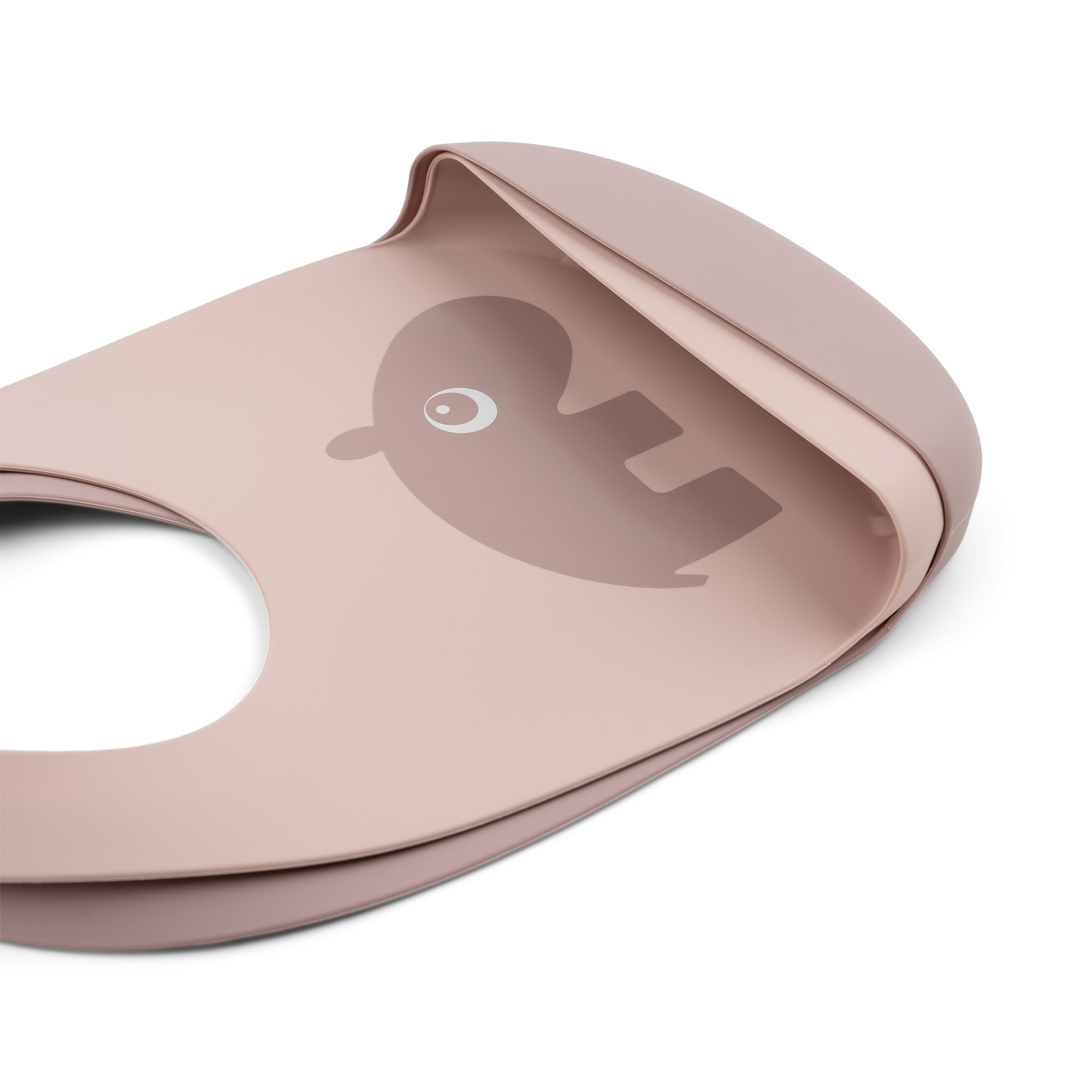 détail du bavoir bébé silicone rose Done by Deer avec poche récupératrice.