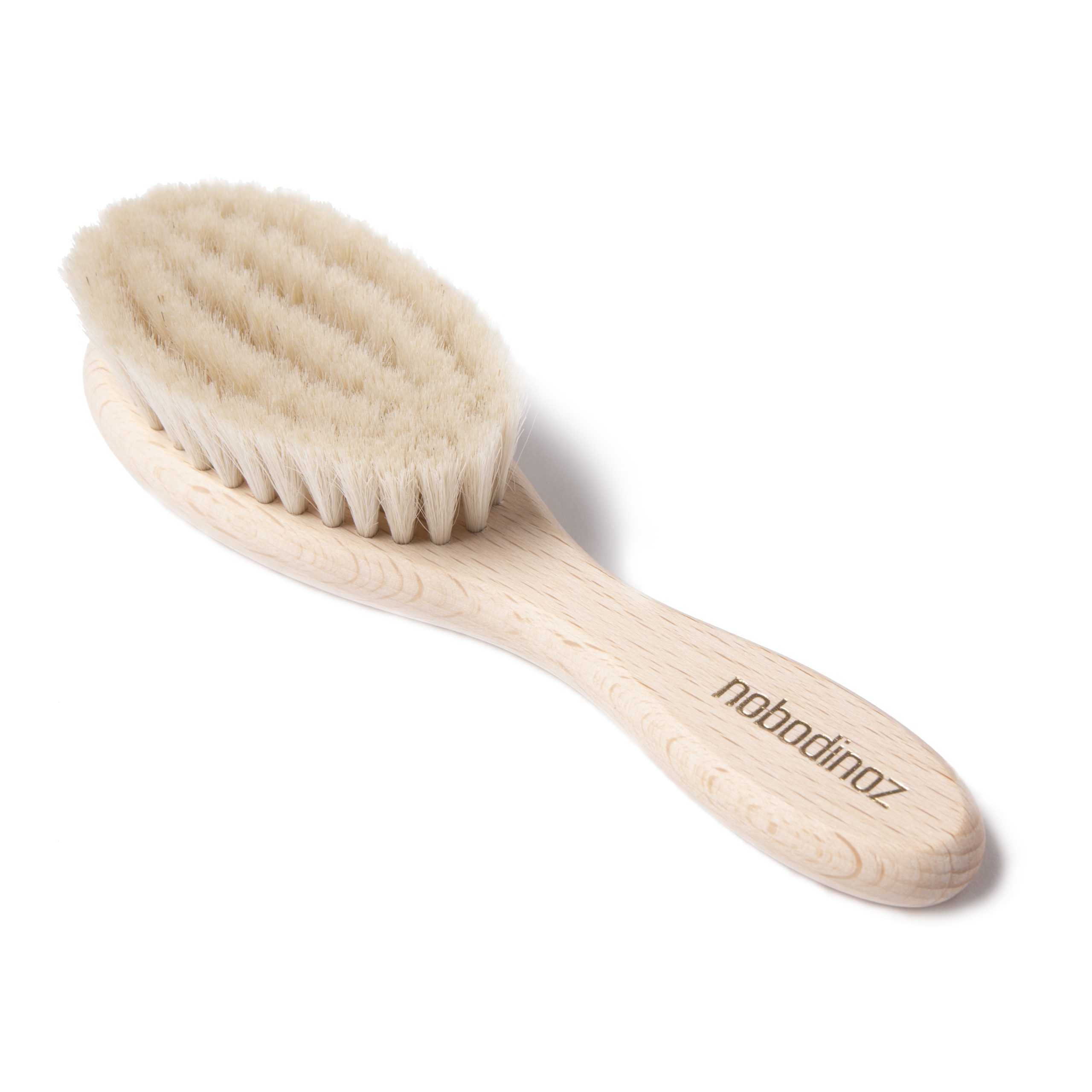 Brosse bébé extra douce en bois de hêtre avec poils de chèvre Nobodinoz.