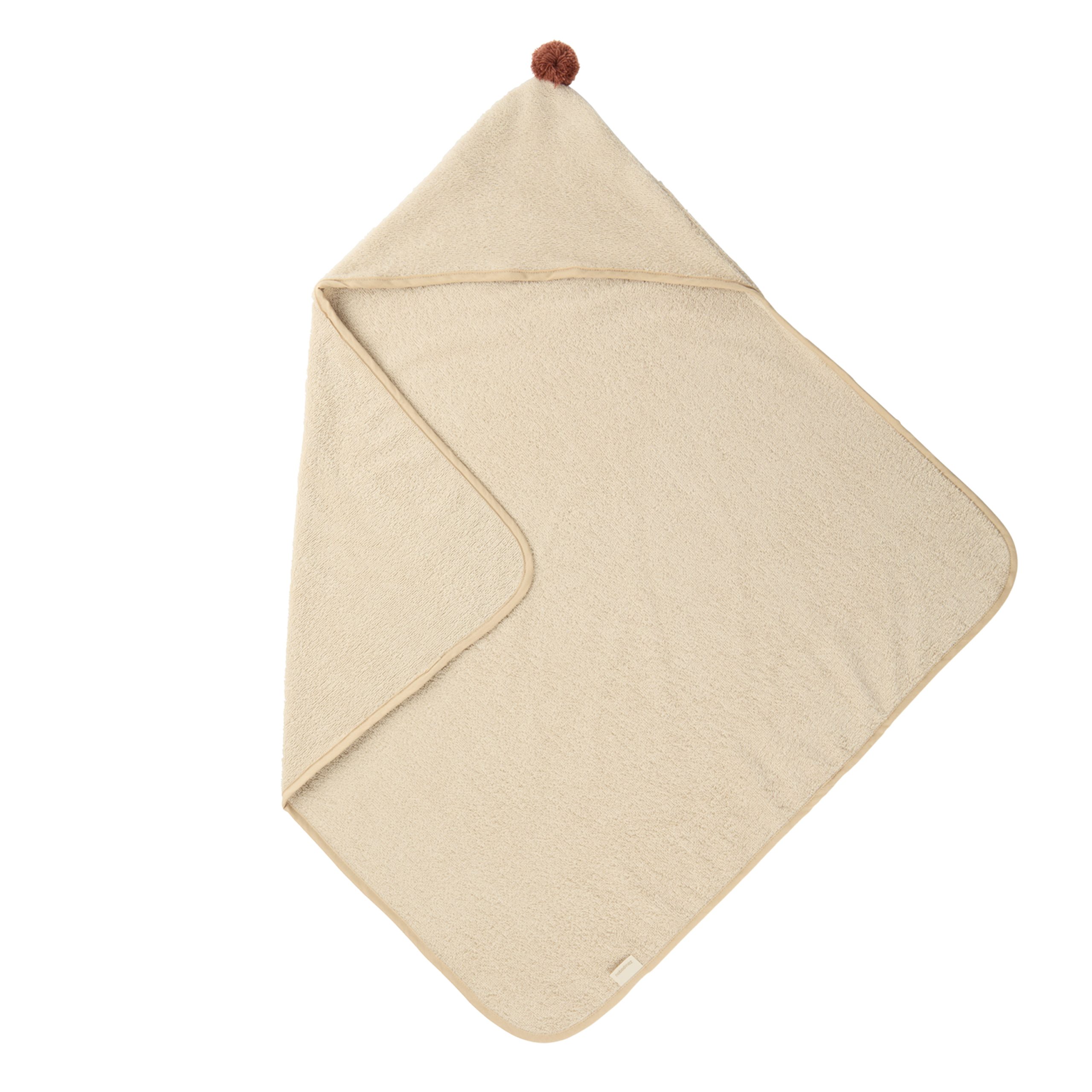 Cape de bain bébé douce Nobodinoz en coton bio coloris amande.