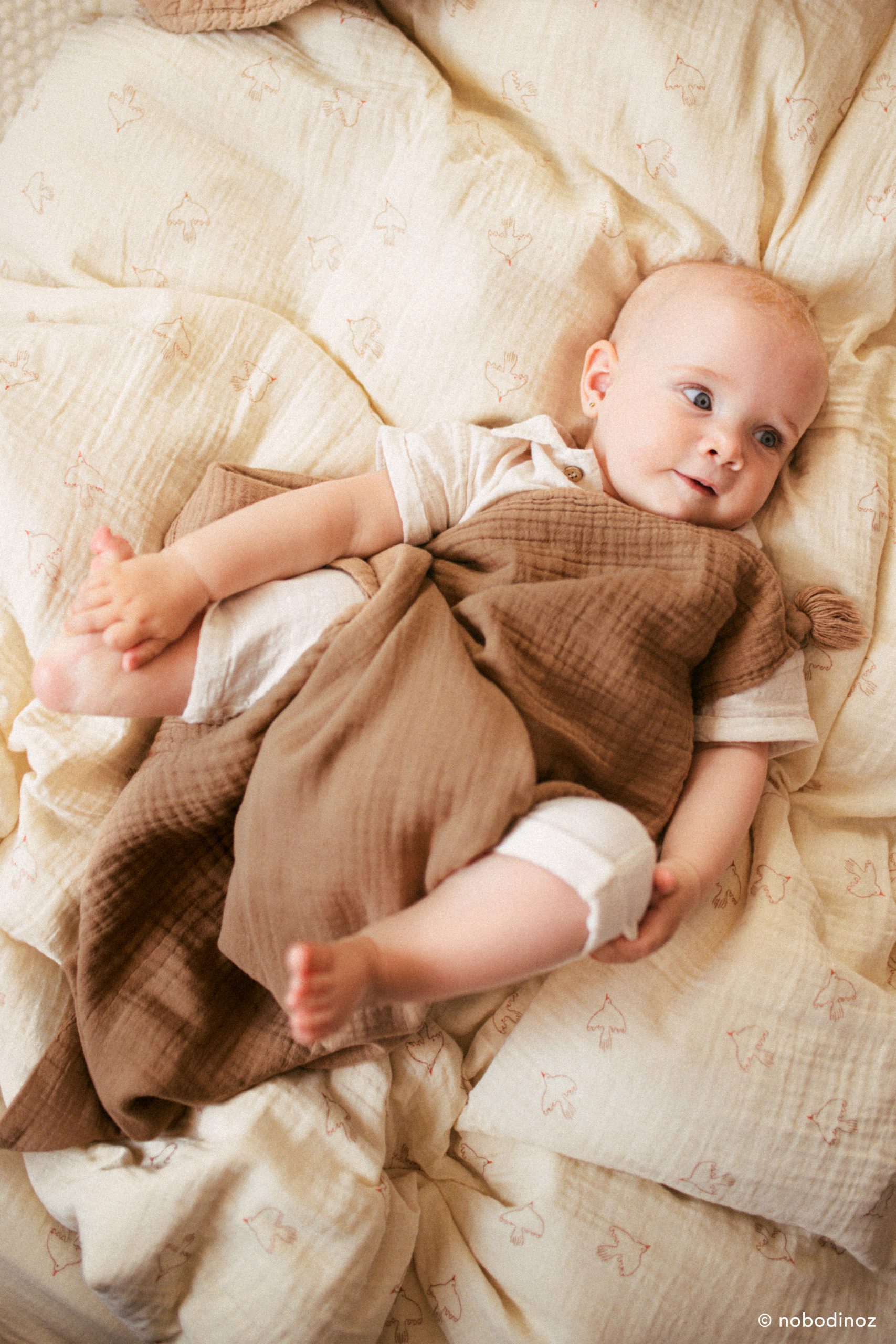 Bébé couverture bebe Nobodinoz marron Sésame Nobodinoz en coton bio.