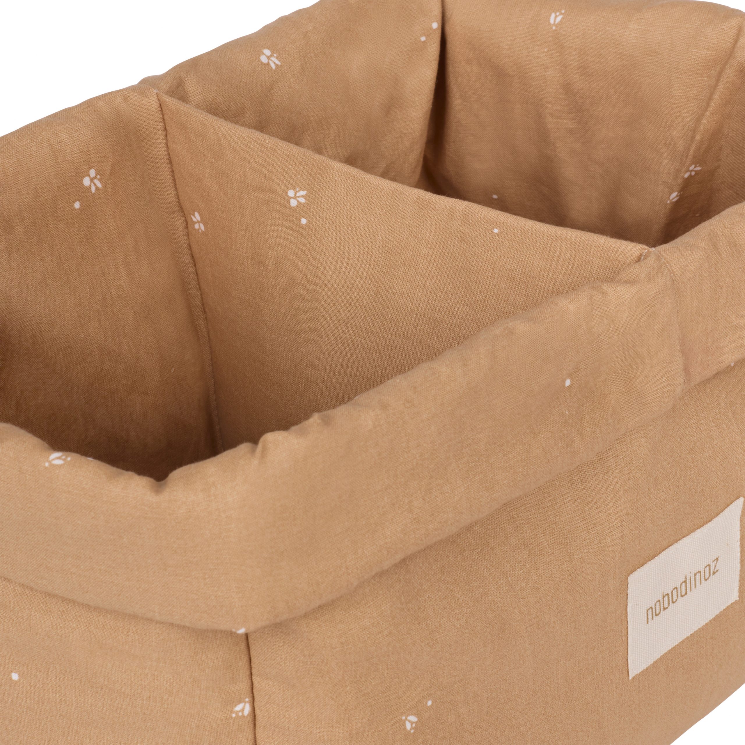 Vue intérieure du panier de rangement double Nobodinoz montrant ses deux compartiments en coton blush à motif cerises