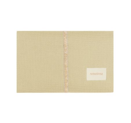 Matelas à langer de voyage Mozart Green Tea Nobodinoz en coton bio, fermé