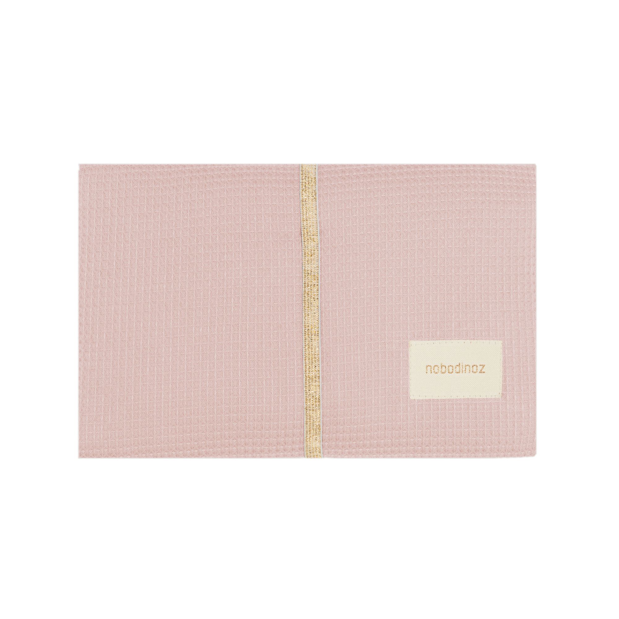 Matelas à langer nomade rose pâle Nobodinoz plié et fermé
