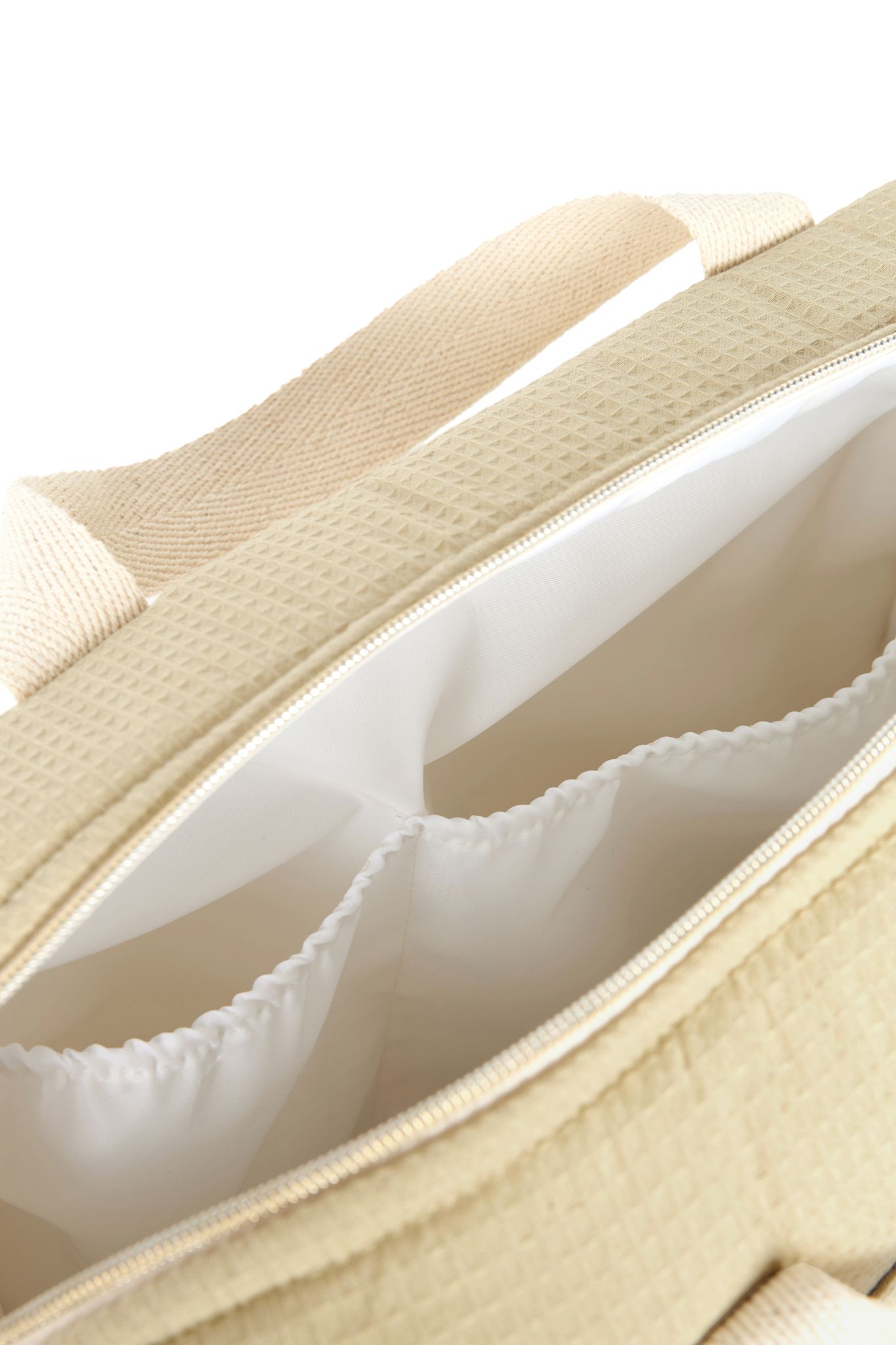 Compartiments intérieurs du sac à langer Nobodinoz vert d'eau Gala Opera