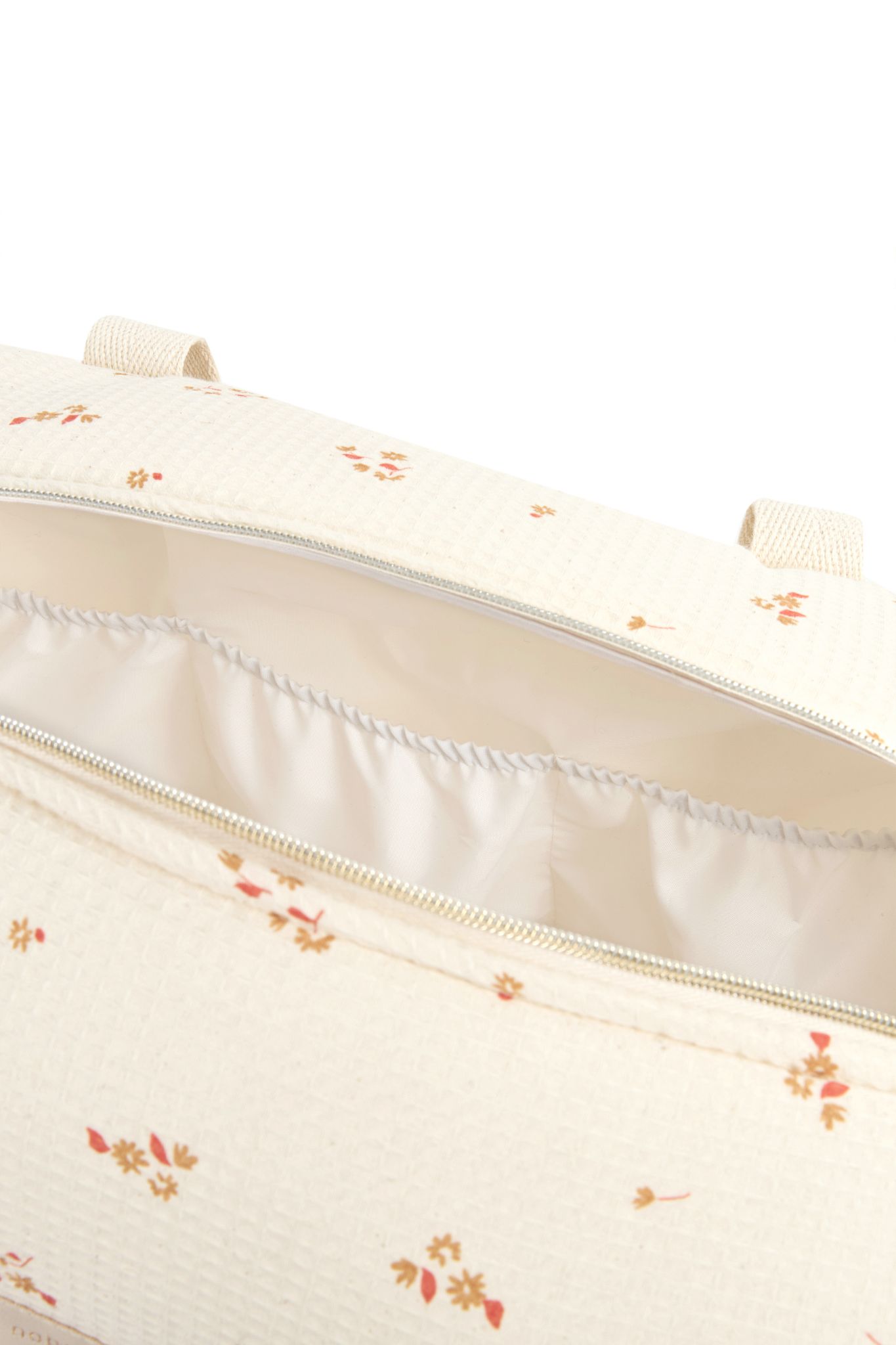 Intérieur imperméable et poches du sac à langer Opera yellow lily Nobodinoz